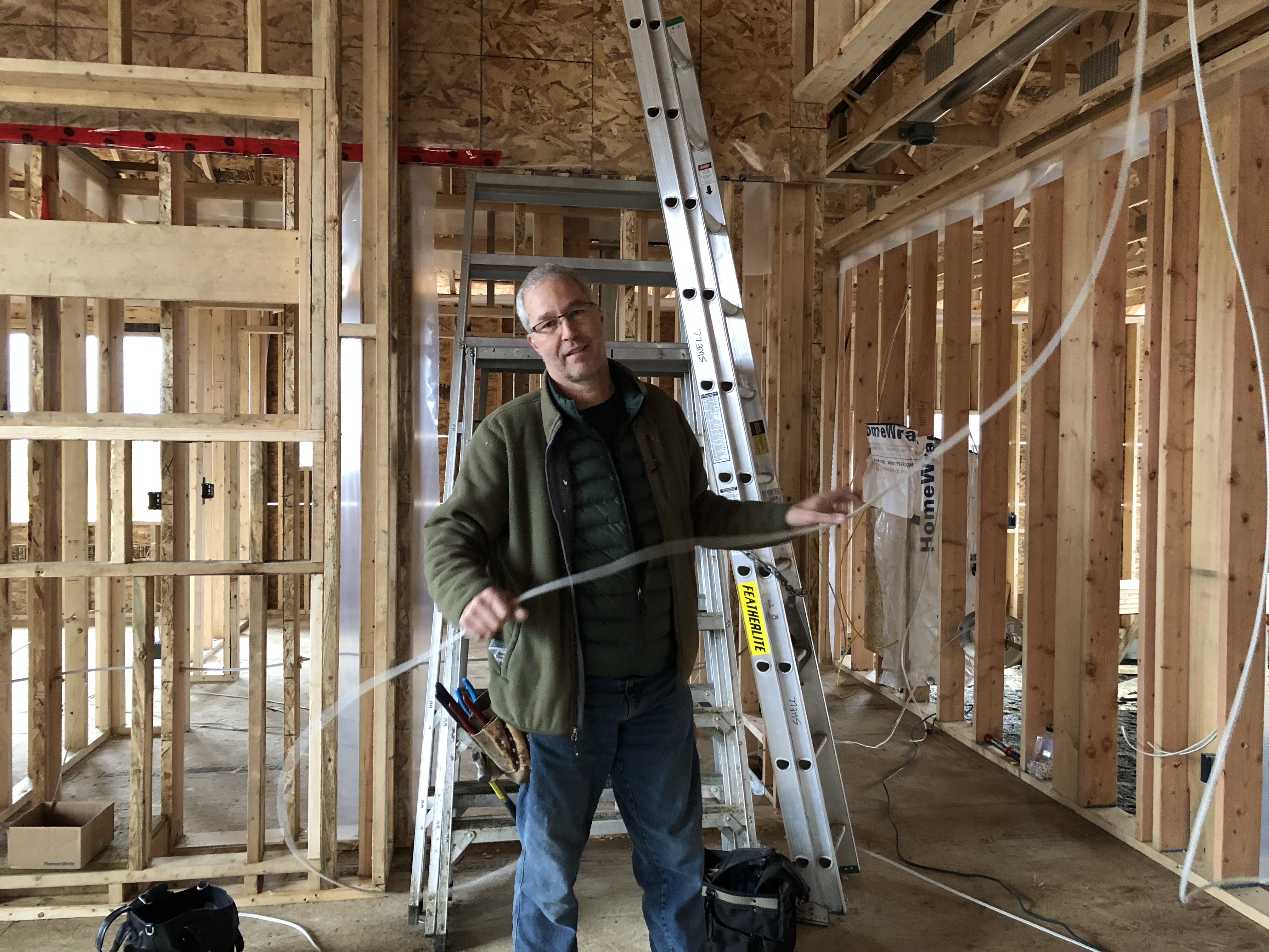 photo of electrician wiring new home in The Ridge