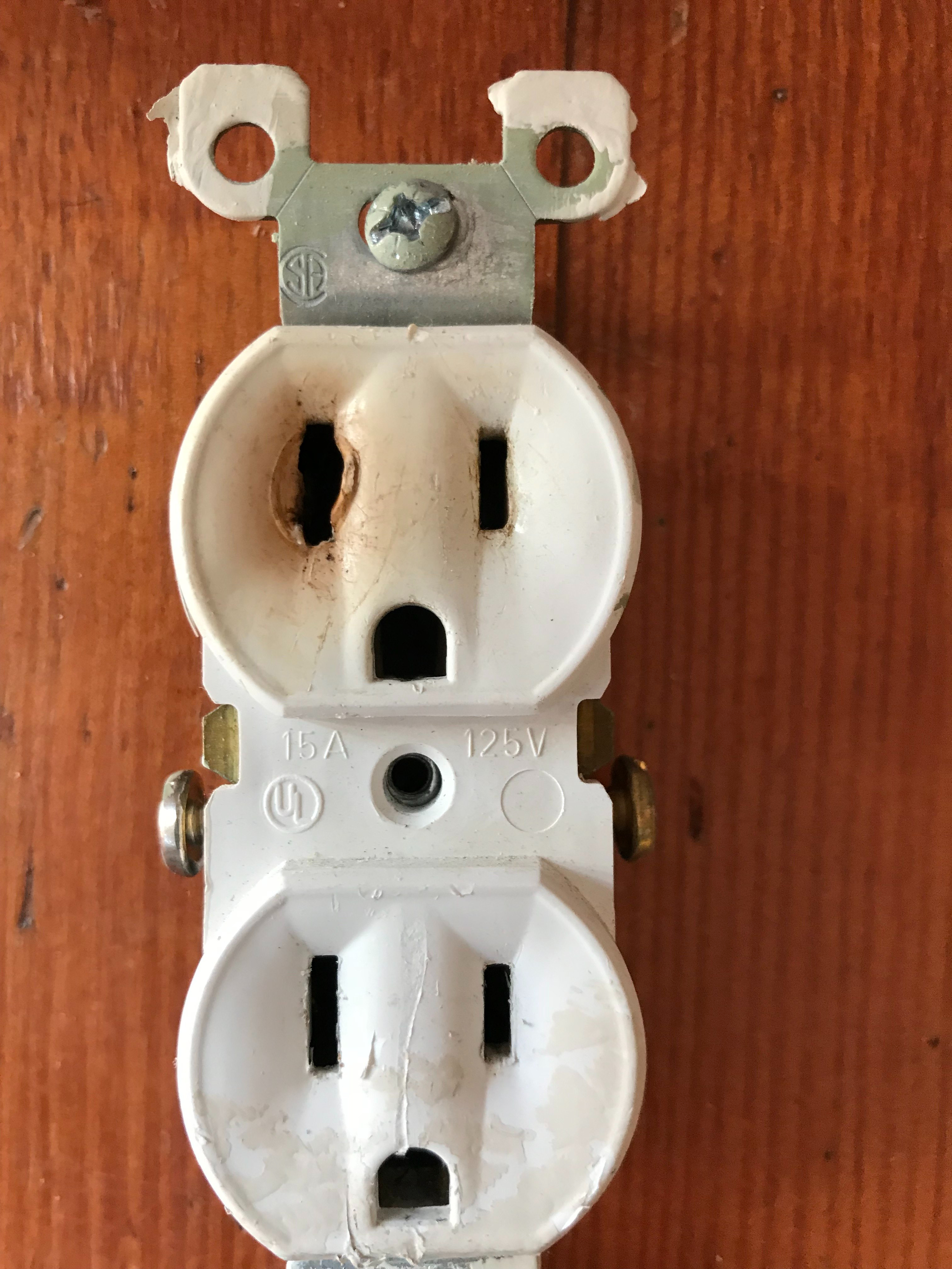 Dangerous use of extension cords burned this receptacle